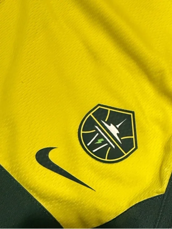 Nike Yellow Shorts with Dark Green Accents - Picture 2 of 4